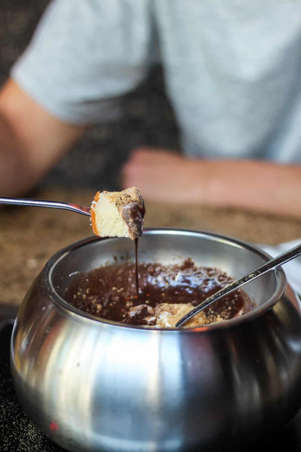 The Melting Pot signature dishes The Original w/ Crunchy Peanut ButterChocolate SmoresPure Chocolate (Chocolate Fondue)